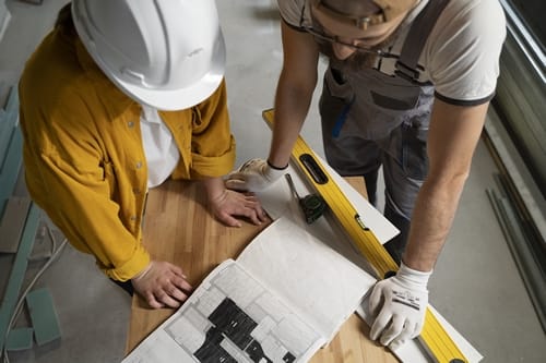 da4b7b2d-916a-44d0-a5ec-3983d2c6a906.tiler-working-renovation-apartment
