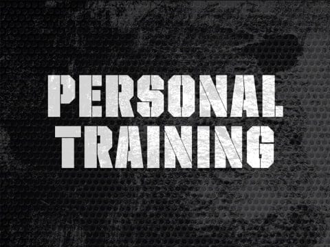Personal training in kids boxing techniques on a black background.